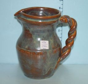 Frank Stuart Pottery Pitcher with Twisted Handle Frank Stuart Pottery Pitcher with Twisted Handle; 8" h.