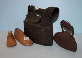 Two Antique Irons along with Two Wood Shoe Forms Two Antique Irons along with Two Wood Shoe Forms; 5 1/2"