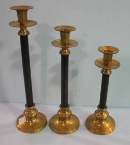 Three Brass and Metal Candlesticks Three Brass and Metal Candlesticks; 14"h.