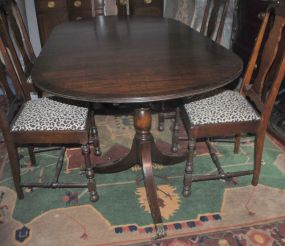 Vintage Duncan Phyfe Style Dining Table Vintage Duncan Phyfe Style Dining Table with brass paw feet; 30" h., 83" w.