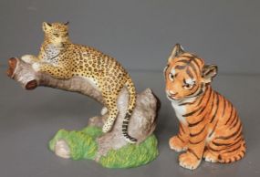 1995 Lenox Porcelain Figure "The Spotted Leopard" along with 1994 Porcelain Tiger Cub Description: 1995 Lenox Porcelain Figure "The Spotted Leopard" (7 1/2" h. ) along with 1994 Porcelain Tiger Cub (7" h.)