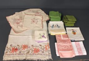 Vintage Napkins Description: Vintage Napkins; twenty 15" square green napkins, six napkins with grape design. Set of four linen tablemats with pink embroidery along with four matching napkins. Various embroidered towels.