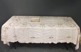 Made in China Tablecloth and Twelve Napkins Description: Made in China Tablecloth and Twelve Napkins; with cut and stitch work pattern along with twelve matching napkins; 98" x 70"