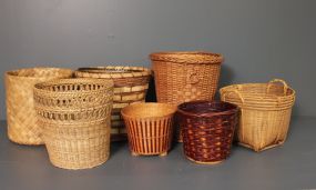 Group of Eight Baskets and Waste Cans Description: Group of Eight Baskets and Waste Cans; sizes range from 13"h. to 5 3/4" h.