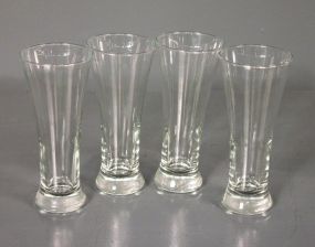 Four Clear Glasses Description: Four Clear Glasses; 7" h., fluted at top