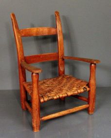 Child's Cane Bottom Chair Description: Child's Cane Bottom Chair; 21 1/2" h., 15" w.