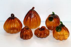 Six Various Size Glass Pumpkins