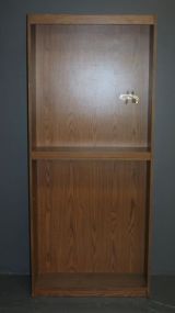  Large Particle Board Three Shelf Cabinet Description: Large Particle Board Three Shelf Cabinet; 84" h., 36" w., 11" d.