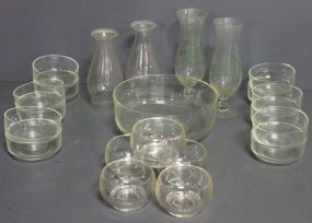 Group of Glassware Description: Group of Glassware, group includes; two O'Brien hurricane glasses, two hurricane shades, 10" fruit bowl, twelve 5" berry bowls, five 4" bowls
