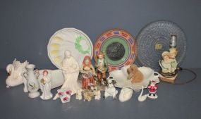  Group of Miscellaneous Porcelain Items Description: Box lot of Porcelain. Pair of Homco Figurines 8"h. Mother and Child 8"h. Heart shaped dish, fruit dish, small vase 5"h., egg tray, painted pottery wall plaque, animals.
