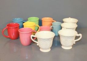  Group of Twelve Coffee Mugs Description: Group of Twelve Coffee Mugs, eight are colored like Fiestaware.