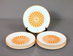  Set of Eight Fitz and Floyd Luncheon Plates Description: Set of Eight Fitz and Floyd Luncheon Plates; white and orange pattern, three with chips on rim; 7 1/2" dia.