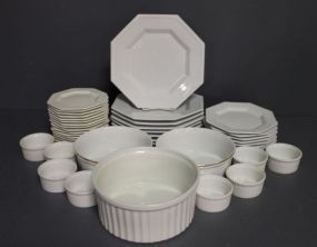  Group of Ironstone Description: Group of Ironstone, which includes; eight 16 1/2" plates, eight 7 1/2" plates, sixteen 6" plates, eight ramekins, three 7 1/2" bowls