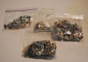  Group of Miscellaneous Costume Jewelry Description: Four bags of Costume Jewelry, Include several colored stone sets, lots of pairs of vintage earrings and Assorted Lot of Assorted Costume Jewelry, mostly beads and vintage pins