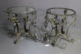  Two Iron Glass Top Tables and Iron Wall Piece Description: Two Iron Glass Top Tables and Iron Wall Piece, glass on one table missing, tables 25" dia., 23" h., wall plaque 32" w., 21 1/2" h.