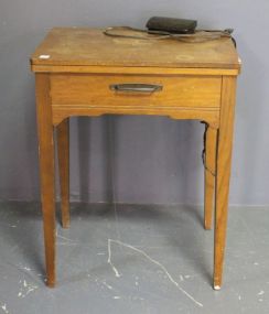  Vintage Singer Sewing Machine Description: Vintage Singer Sewing Machine, 24"w, 30"h, 18"d.