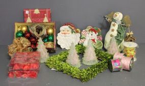  Group of Miscellaneous Christmas Items Description: Box lot of Christmas decorations (not all in photo) rolls of ribbon, 2 plates, 4 beaded trees, mistletoe frame, bulbs.