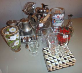  Group of Kitchen Items Group of Kitchen Items; metal salt and pepper shakers, four drinking glasses, tooth pick dispenser, three shot glasses and various utensils