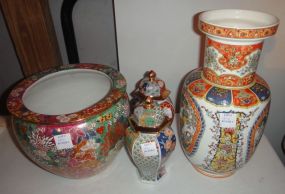  Four Oriental Style Vases Four Oriental Style Vases; one vase made in China, two small vases made in Japan and one tall vase (oriental style) made in Italy; tallest 12 1/2" h.