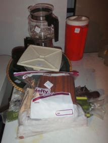 Group of Miscellaneous Kitchen Items Group of Miscellaneous Kitchen Items, group includes; two coffee pots with one filter, group of knives with small chopping block, decorative casserole dish, tupperware and water pitcher