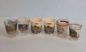  Group of Jiggers Group of Jiggers; Memphis, Charleston, Elvis, Eureka Springs, two Rainforest Caf' 2 1/2" h.