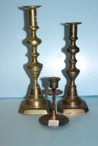  Three Various Size Brass Candlesticks 4 1/2" , 9 1/2" , 11 1/2" h.