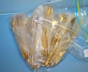  Set of Marquride Stainless Set of Marqurite stainless by present consisting of 8 dinner forks, 8 salad forks, 16 teaspoons, 8 large table spoons, 8 salad forks, 16 teaspoons, 8 large table spoons, 8 knives, jelly spoon, butter knife has gold wa