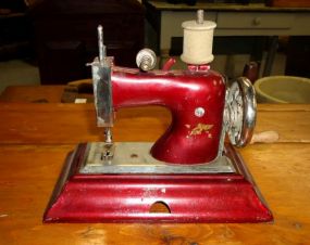  Toy Sewing Machine Made in Germany Toy Sewing Machine Made in germany, metal 8" x 5 1/2"