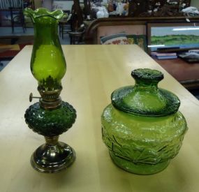  Oil Lamp and Jar with Lid Small green glass oil lamp 9 1/4h and green jar with lid 6 1/4"