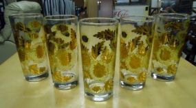  Five Clear & Gold Print Glasses Five clear & gold print glasses 6 1/4" h.
