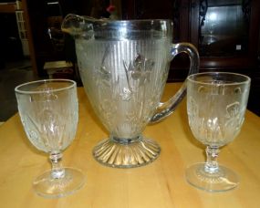  Pitcher and two glasses with flowers Pitcher and two glasses with flowers 14 1/2"h.
