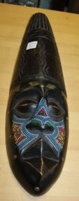  Wood Carved Ghana Tribal Mask Wood Carved Ghana Tribal Mask, colorful beading on front; 19" h., 5" w.