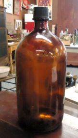 Large Brown Tone Medicine Bottle Large Brown Tone Medicine Bottle; 13 1/2" h.