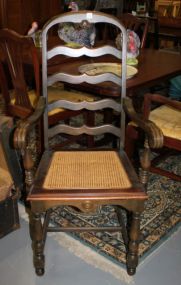  Cane Bottom Arm Chair Cane Bottom Arm Chair; 43" h., 21" w.