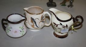  Three Vintage Luster Pitchers 3"h.