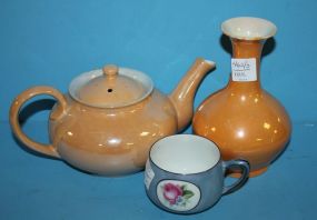  Three Pieces of Luster teapot, vase 7"h., and cup.