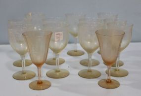  Set of Eleven Etched Wine Glasses Three chipped; two pink etched glasses, one chipped