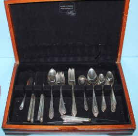  Holmes & Edwards Silverplate Flatware Consisting of 16 teaspoons, 9 tablespoons, 1 soup spoon, 7 dinner forks, 8 salad forks, 2 serving spoons, butter knife, eight knives ; 52 pieces total