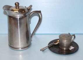  Stainless Steel Pitcher, Small Saucer, Two Spoons, Plate Pitcher 7 1/2" h. ; plate 5" dia.