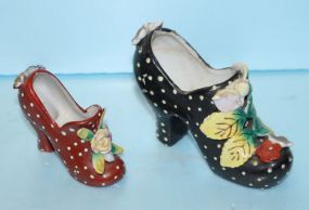  Two Painted and Decorated Porcelain Shoes