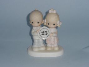  God Blessed Our Years Together W/ So Much Love and Happiness Cross Mark. Serial E-2857. Release Date 1984. Retired 2001.