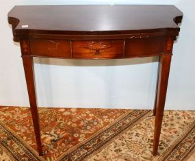  Hepplewhite Style Card Table Mahogany Hepplewhite style card table with inlay urns in center apron and legs; 35" w., 18" d., 31" h.