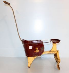 Vintage painted stroller (missing two wheels); 14" w., 23" h.