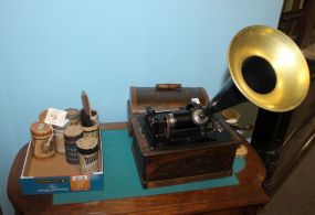 Edison Victrola with original crank, nice oak cabinet. Completely reworked and operational. 11 1/2" w., 8" d., 12" h.