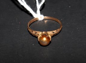Small 10K gold ring with pearl