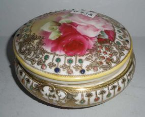 Nippon covered 5" round jeweled powder jar with puff