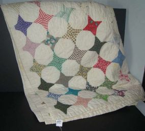 "Four point" star design quilt