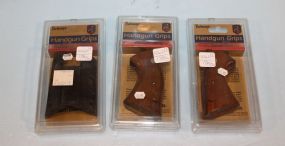 Three Pachmayr Hand Gun Grips Present SN-L, Gripper SK-G and Signature GM-45