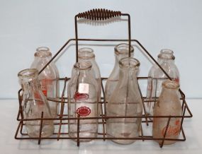 Eight Glass Vintage Milk Bottles in Carrier