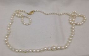 One Graduated Single Strand Pearl Necklace 20.0" Matinee Length